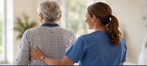Healthcare professional supporting a patient